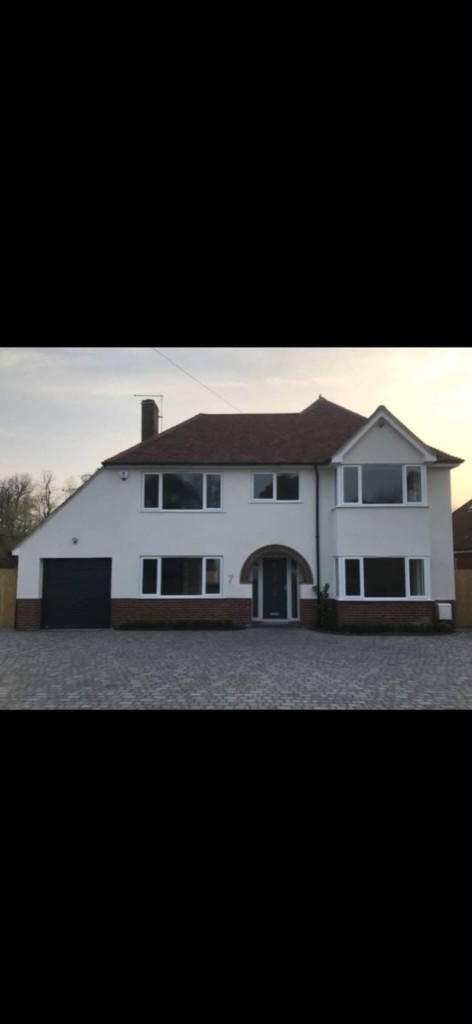 White silicone rendering on a detached house in Kent