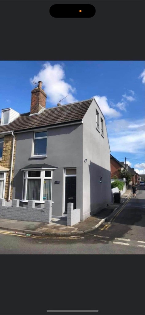Smooth render on an older terraced house in Kent